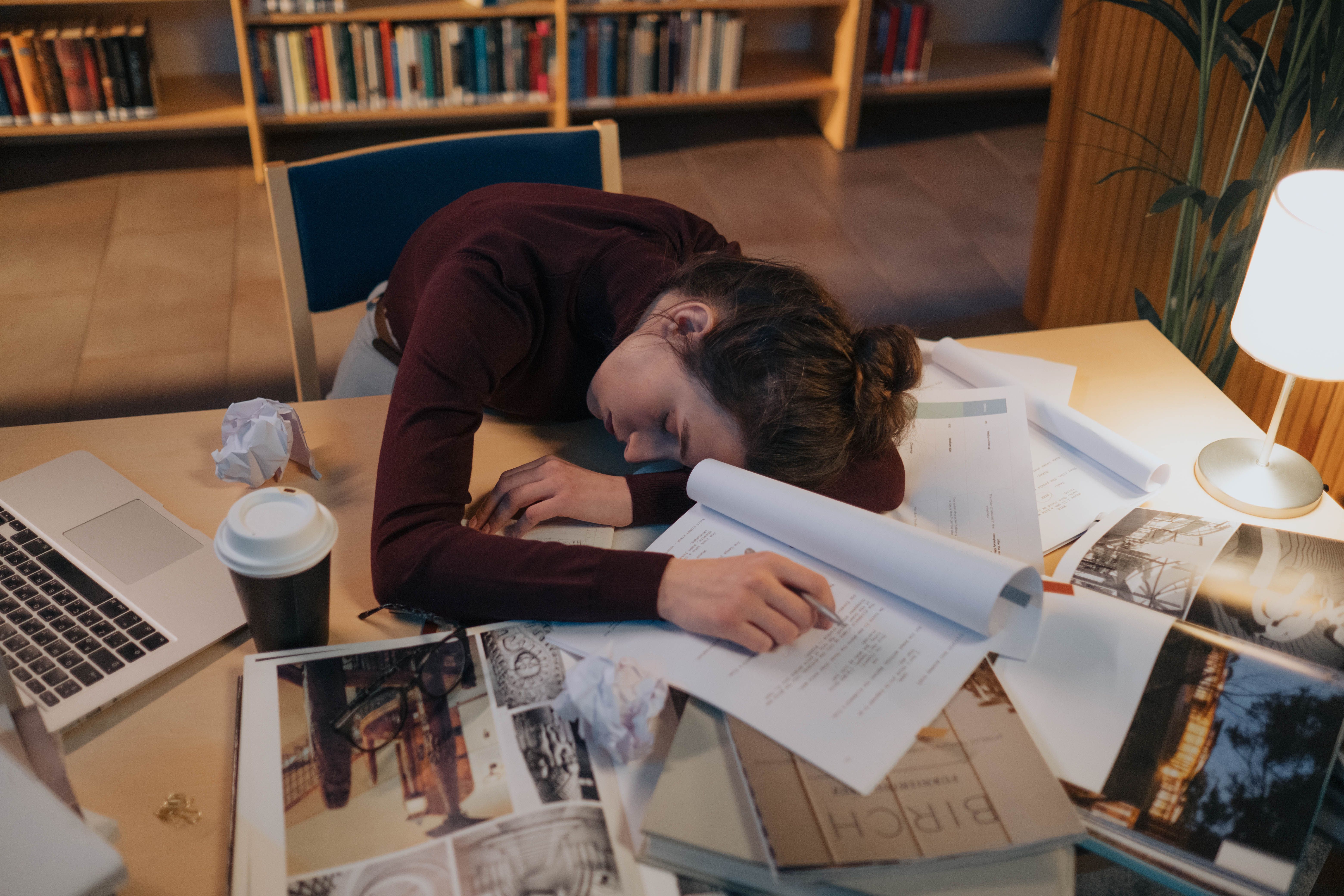 Small business owner overwhelmed by decisions, papers, and late nights — Earl helps you think more clearly.